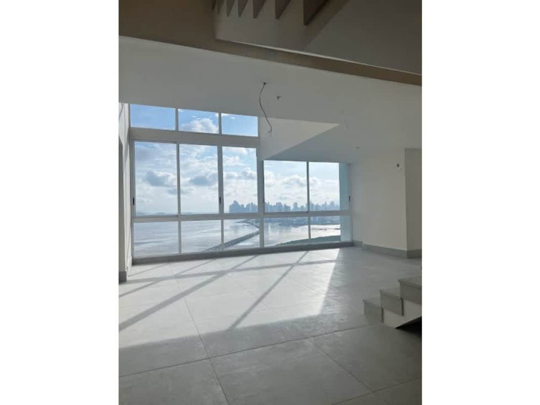 Spacious kitchen with granite countertops and ocean view at PH Asia Penthouse in Panama City