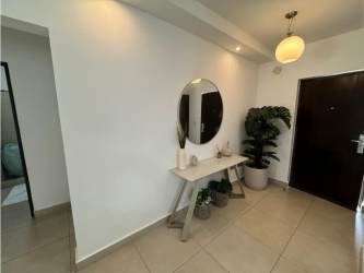 Granite countertop kitchen with modular cabinets and stainless sink in duplex for sale Panama Pacifico