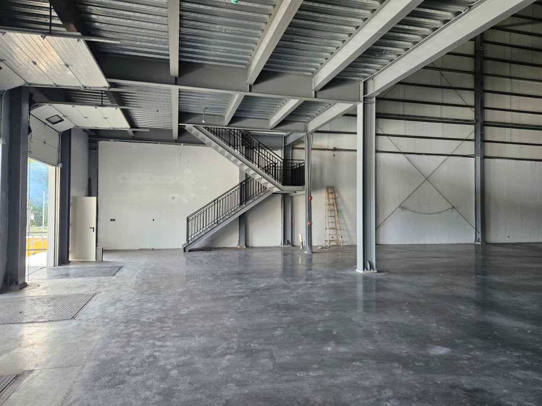 Industrial warehouse interior featuring mezzanine level for offices or storage at Via Centenario Panama City
