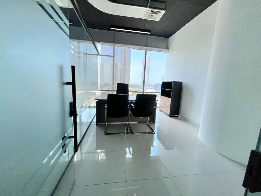 Multiple private offices with glass walls and ceramic tile floors Costa del Este Panama
