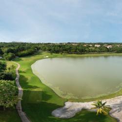 Private beach scene with lounge chair and palm trees Buenaventura Panama