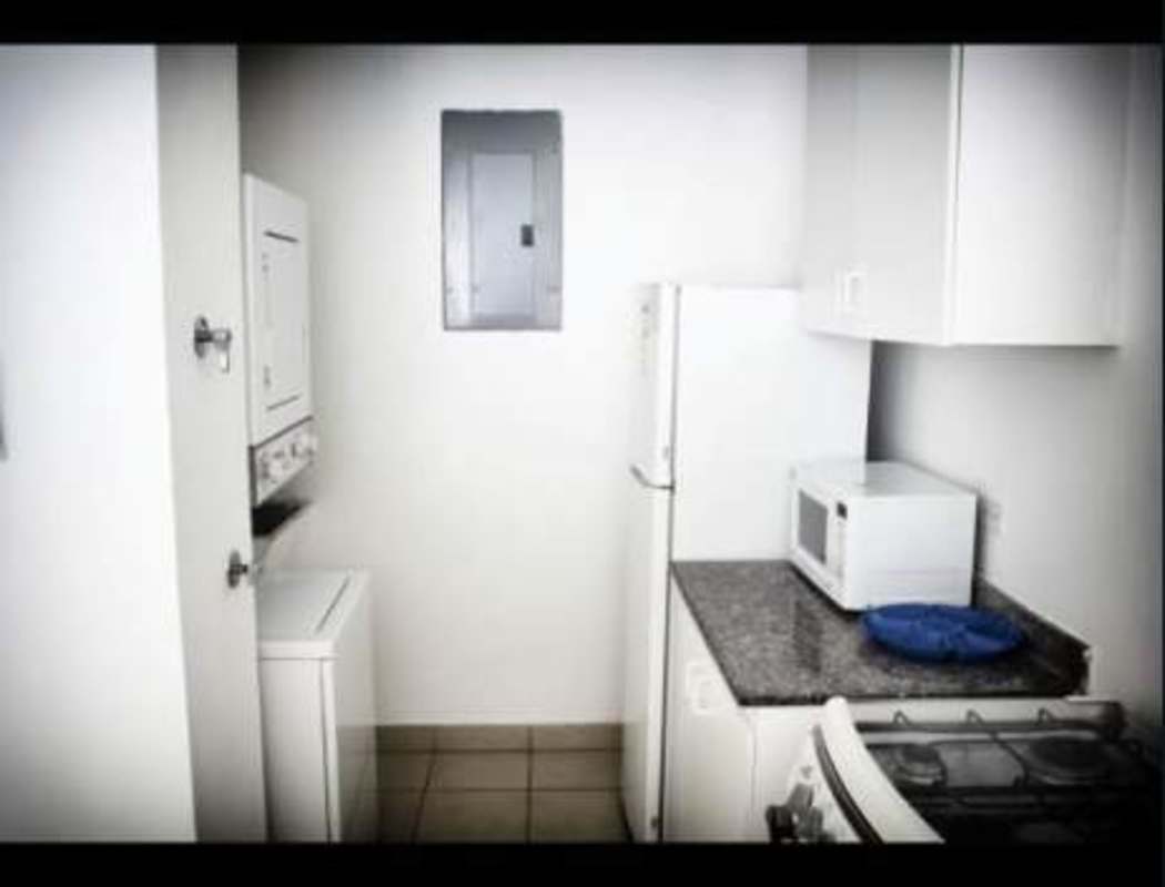 Living dining space with sofa dining table window natural light PH Hortensias Panama City