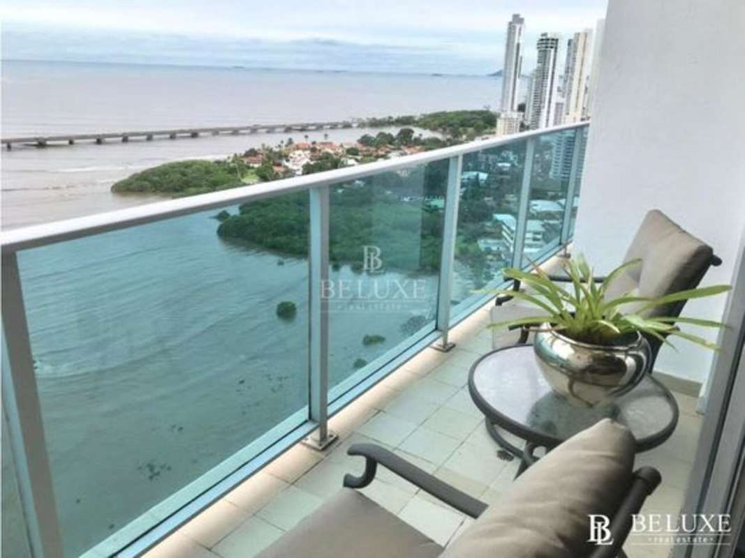 Spacious master bedroom with ocean view windows PH Icon Tower Coco del Mar Panama City