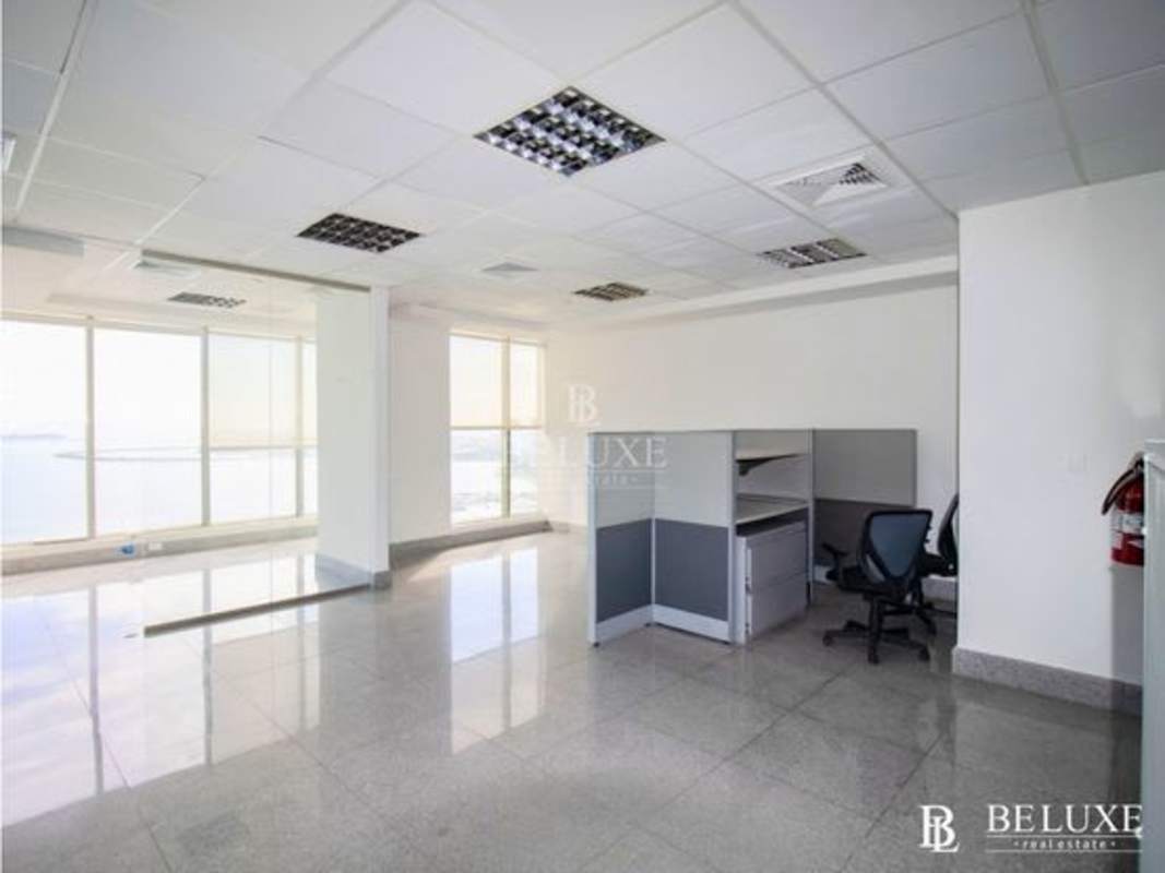 Modern open modular workspace with glass partitions at BICSA Tower Panama