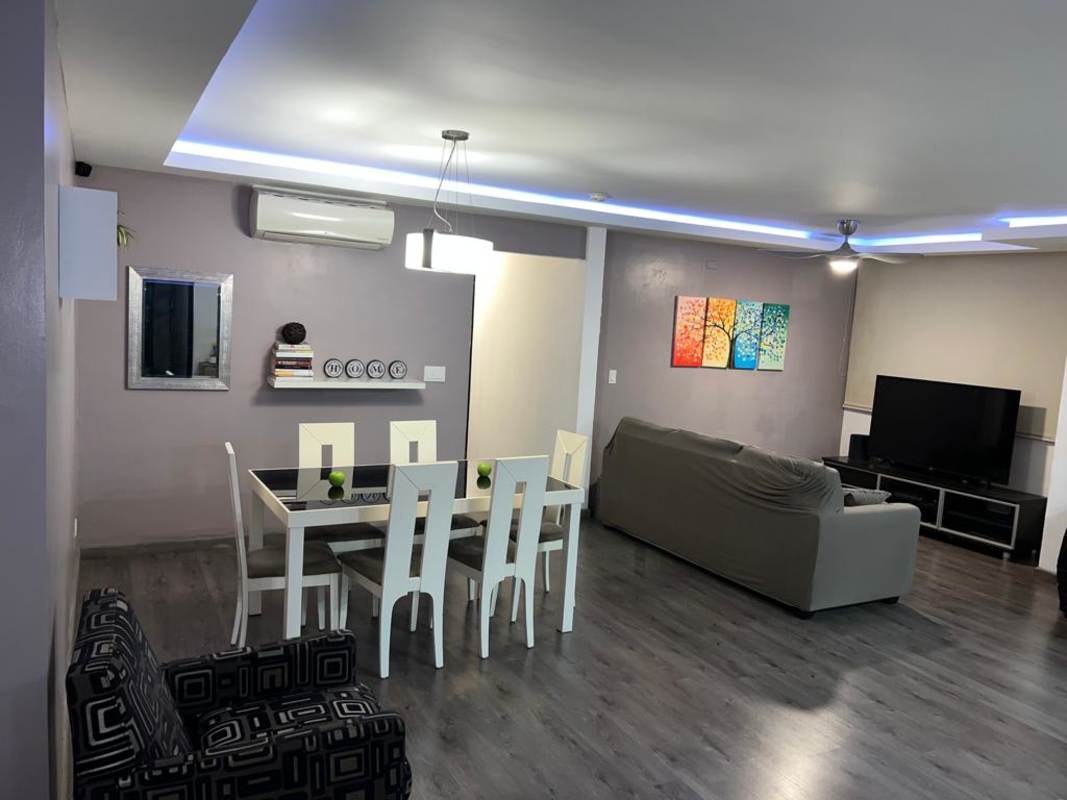 Rooftop swimming pool area with sun deck at PH Onyx Tower El Cangrejo Panama City