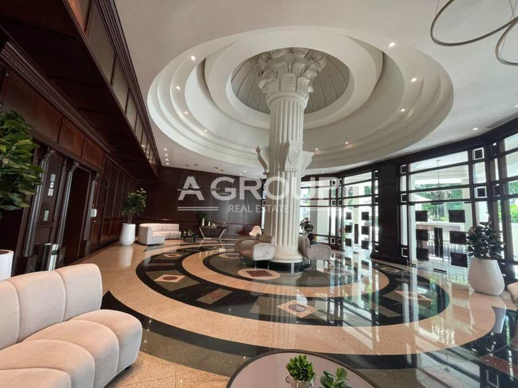 Reception lobby with classical elements, marble floors, seating PH Balboa Tower Bella Vista Panama