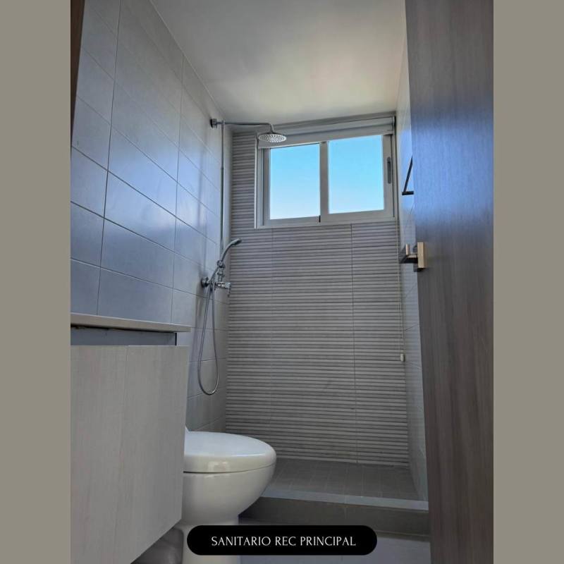 Minimalist bathroom with gray tiles, glass walk-in shower in PH Signature Point La Cresta Panama