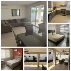 Dining area with AC and modern furnishings in 4 bedroom rental home Bosques del Pacífico Panama Pacifico