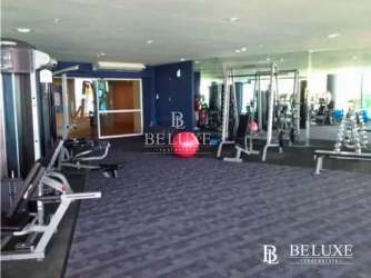 Large beachfront swimming pool with ocean views at Santa Clara Residences Panama