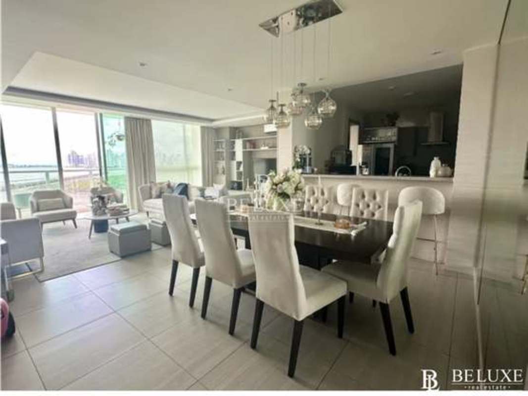 Modern dining area with wall mirror and elegant fixtures PH Asia Costa del Este Panama