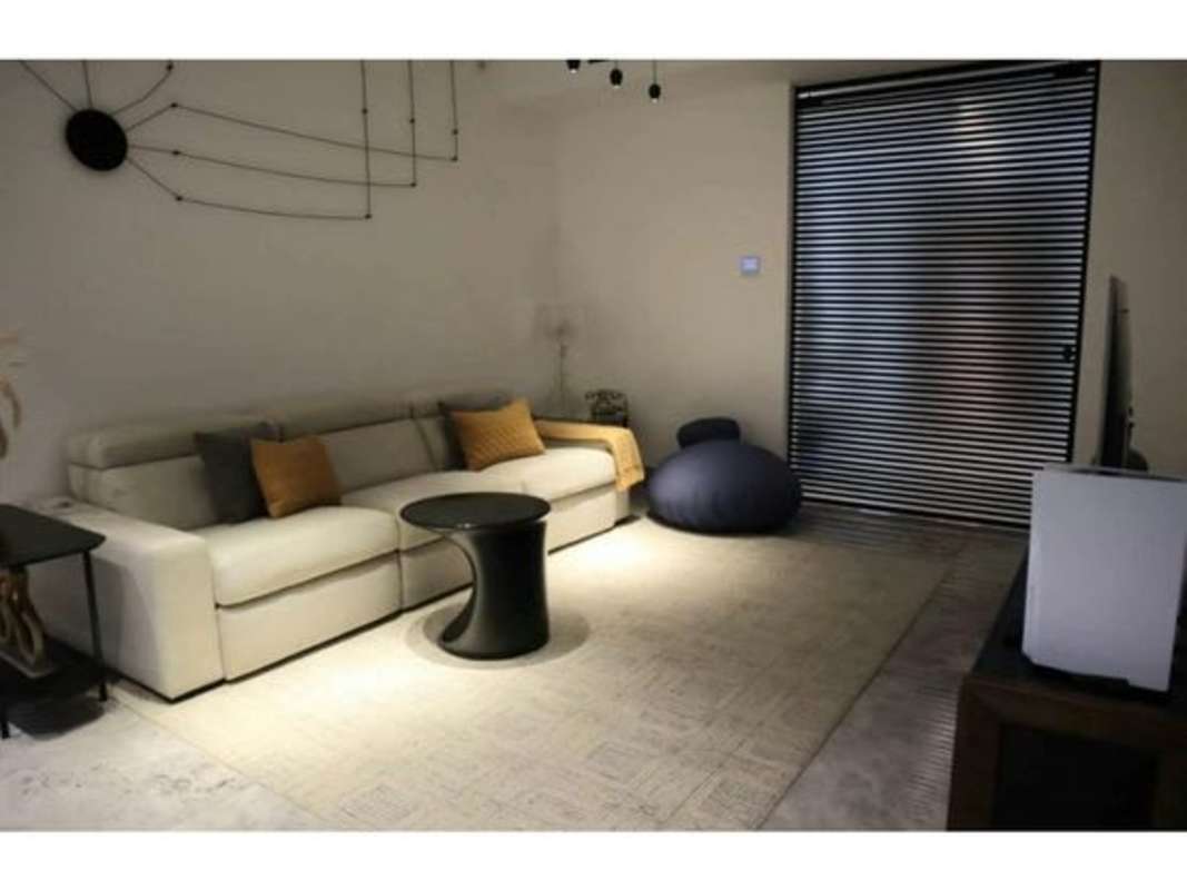 Luxurious master suite with ocean view window in PH Empire Residences Santa Maria Panama