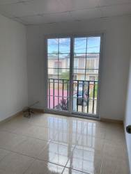 Bedroom with large window doors balcony metal railing tiled floor villa rosario capira rental house panama