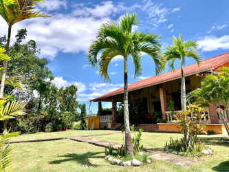 Wooden bar area with decor and lighting inside Restaurant El Galeón Santa Clara Rio Hato Panama