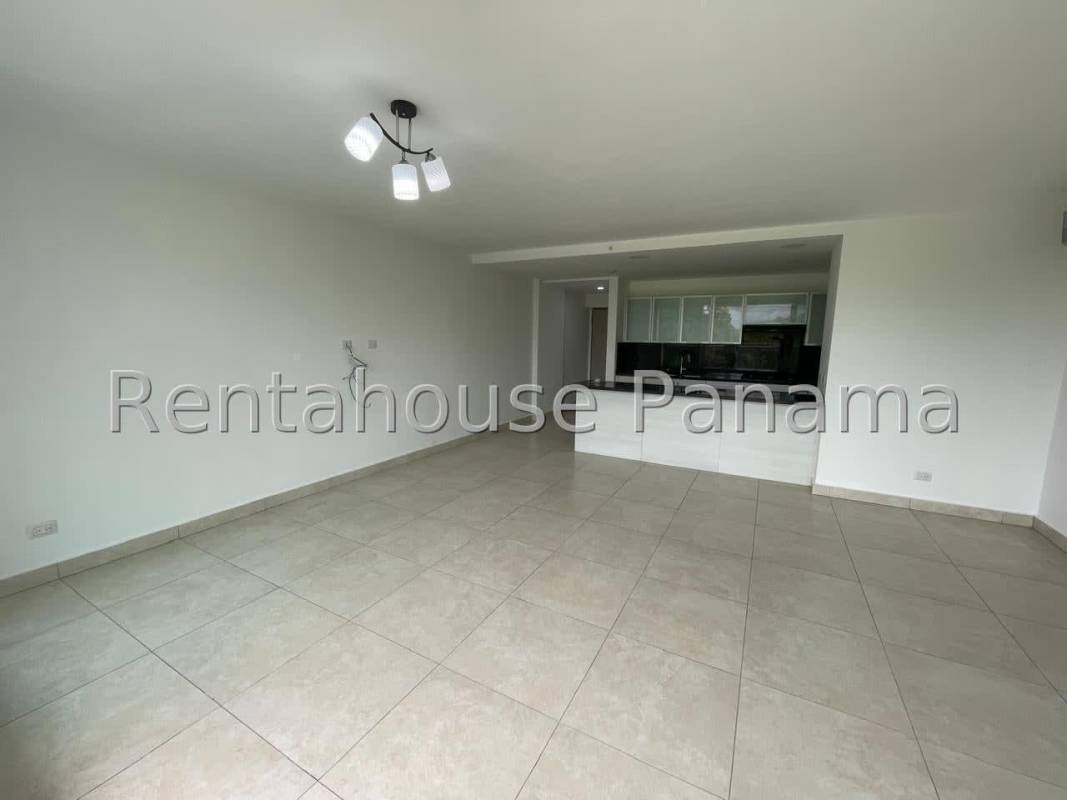 Spacious open living and dining area with large windows at PH Clayton Park Panama City