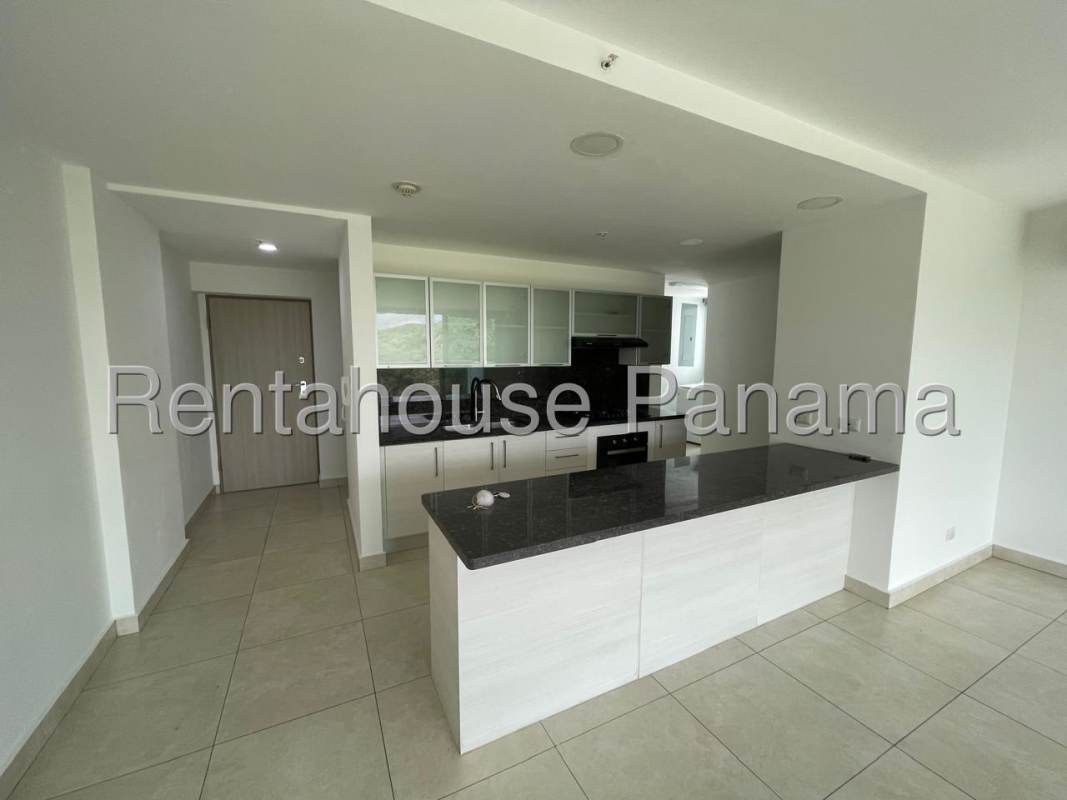 Modern kitchen with granite countertops and ample cabinetry at PH Clayton Park II