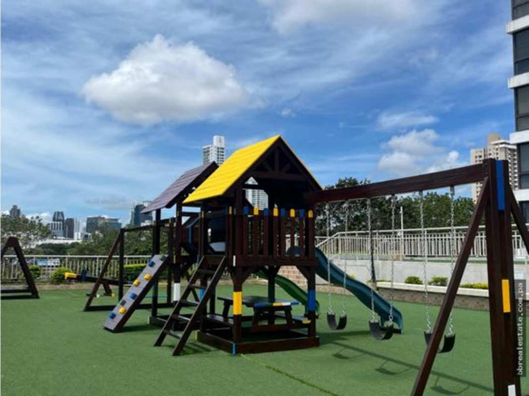 Bathroom with glass shower enclosure, mosaic tile accent, and pedestal sink in PH San Francisco Bay Panama City