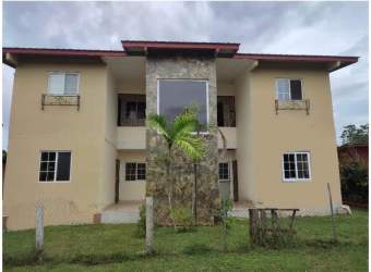 Bedroom with large built-in closet and split air conditioning in apartment building Las Tablas Panama
