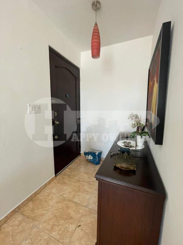 Balcony with glass railing overlooking Panama City skyline in PH Limassol Panama