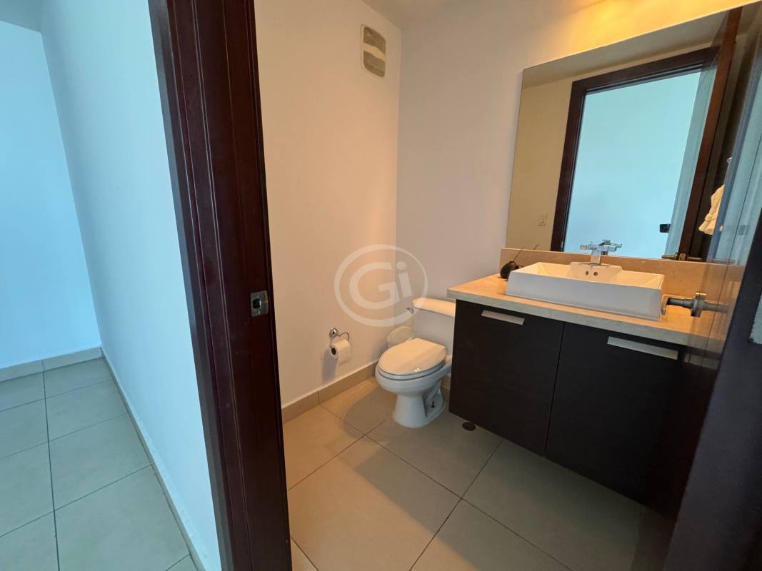 Spacious master bedroom with large windows, walk-in closet in PH Oceanaire Panama City