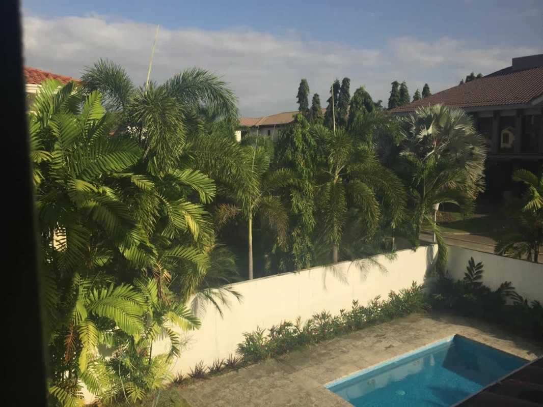 Spacious living room with marble floors, large windows Costa del Este Panama