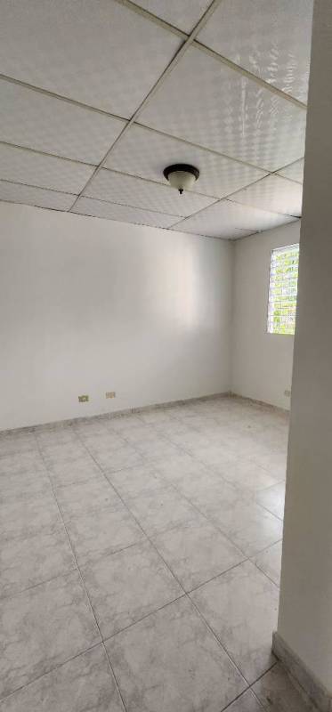 Spacious empty room with white tile and window PH Colinas del Golf Brisas del Golf Panama