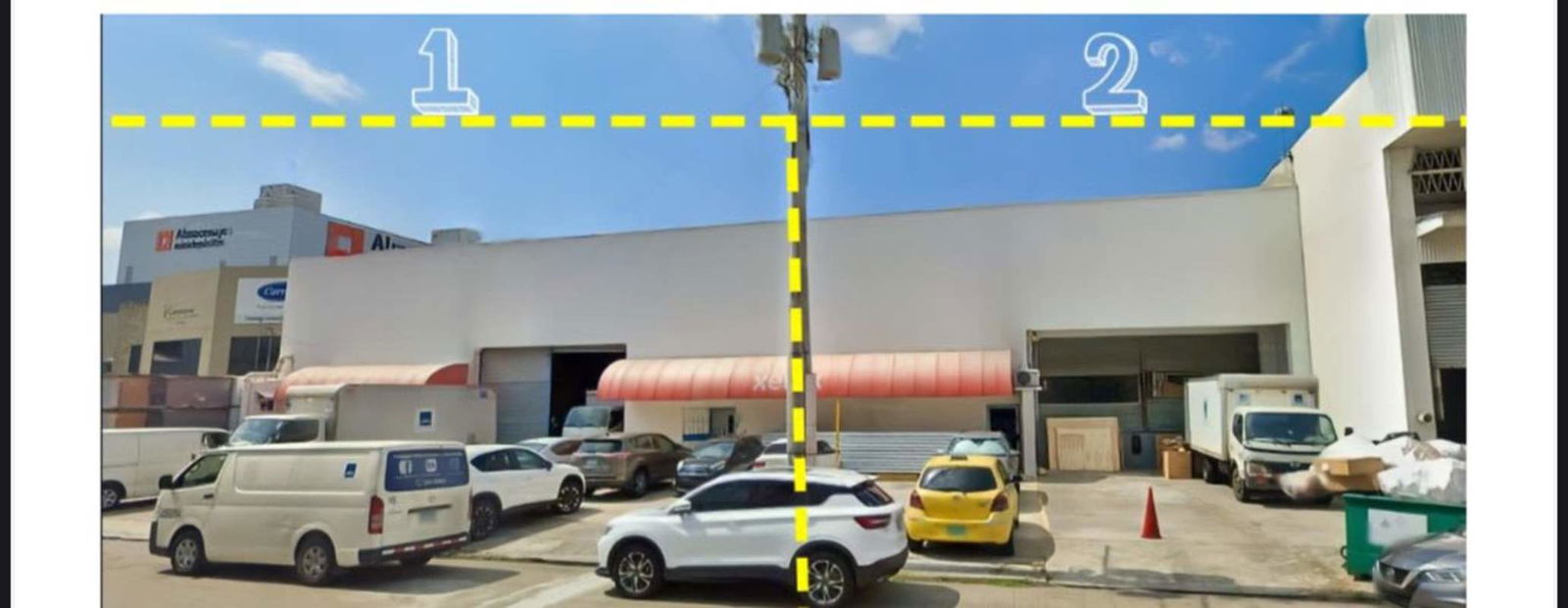 Spacious empty warehouse interior high ceiling and roll-up doors Costa del Este Panama