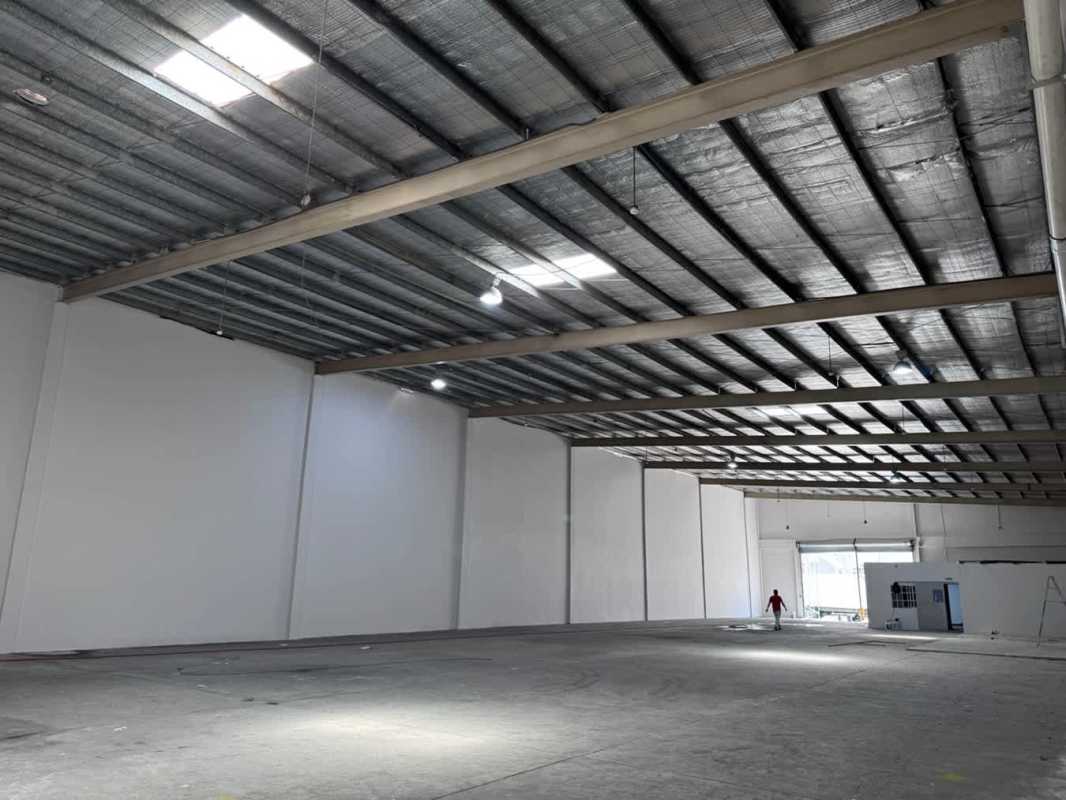 Empty commercial warehouse space insulated metal roofing Panama