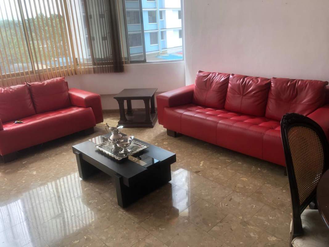 Spacious living room with marble floors and large windows at PH Vista del Dorado Panama City