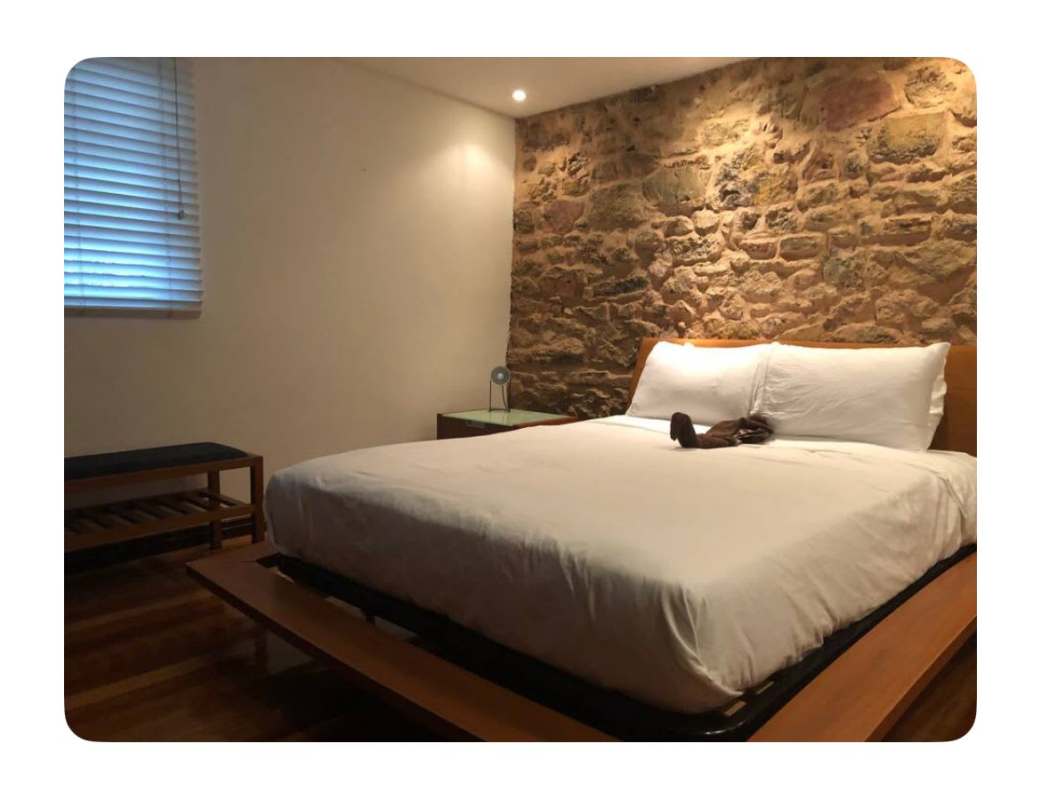 Historic cobblestone street with colonial buildings near PH Santo Domingo Amador Panama