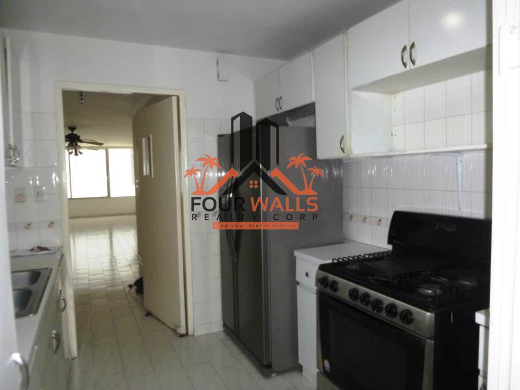 Living room and dining space with tiled floors and ceiling fans PH Ocean View San Francisco Panama