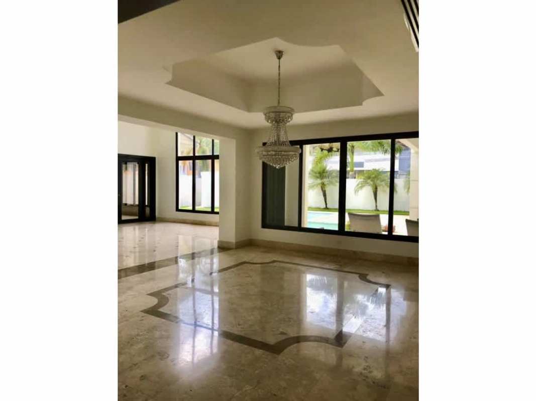 Living room featuring marble floors, crystal chandelier, large windows Costa del Este Panama