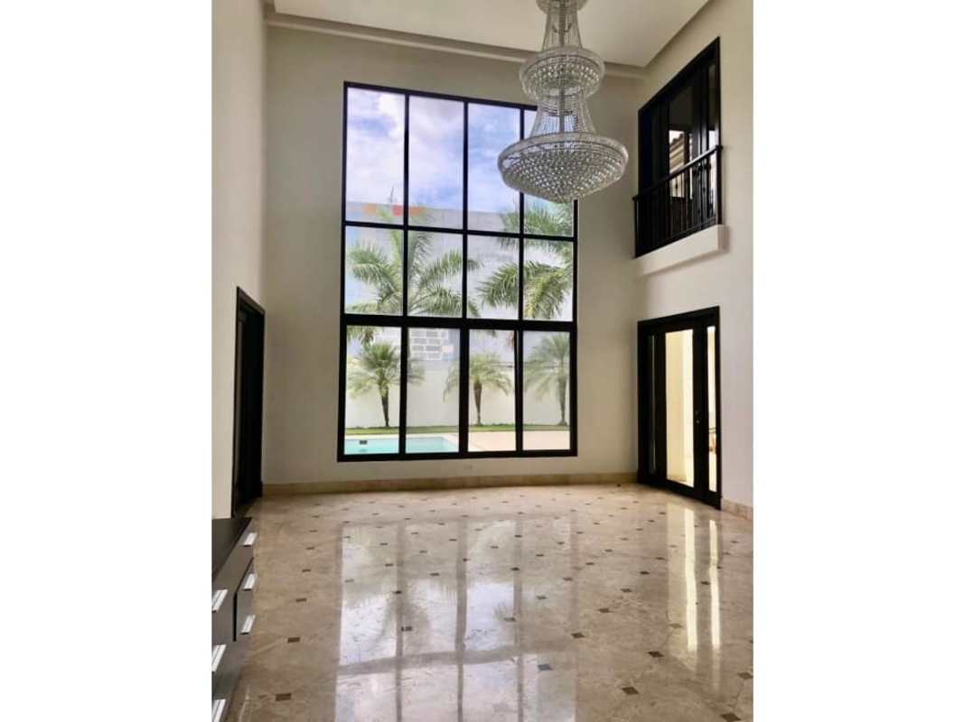 Contemporary kitchen with granite island, stainless fridge, cooktop Costa del Este Panama