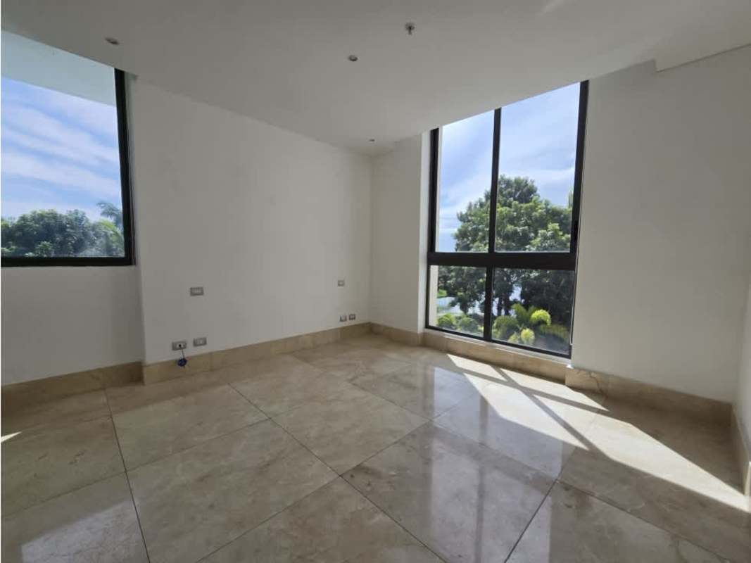 Bright living room with floor-to-ceiling windows and marble flooring PH Valery Point Panama