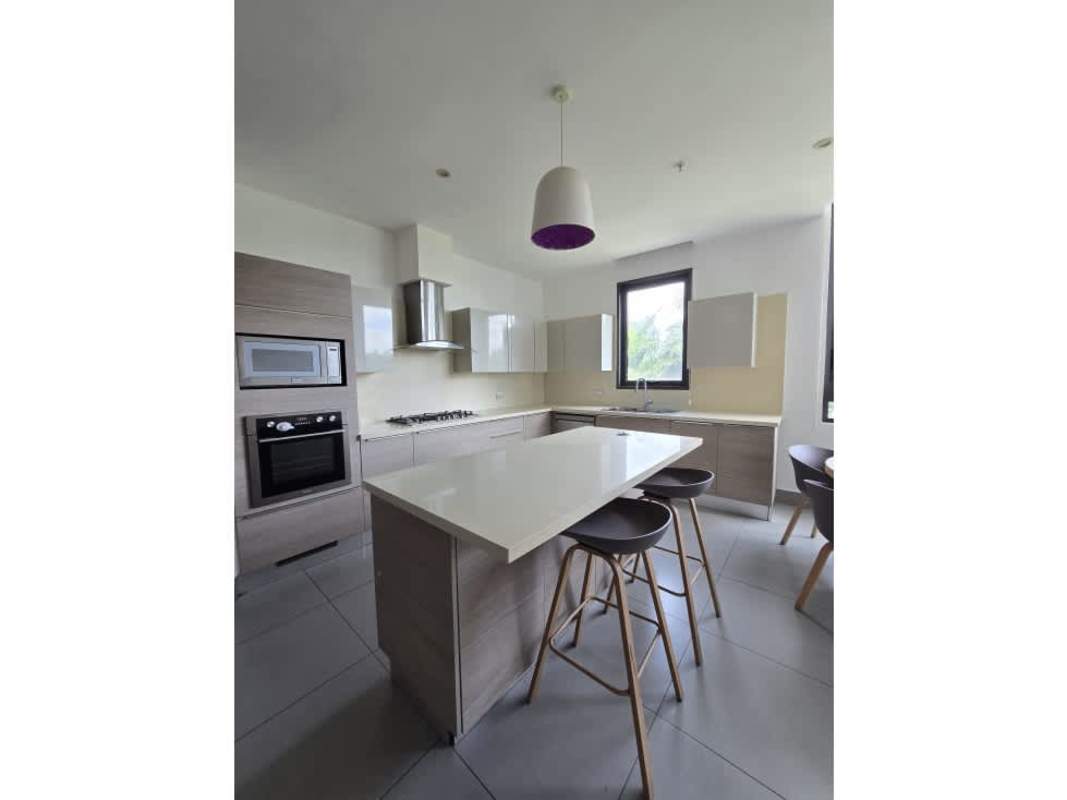 Contemporary gourmet kitchen with center island, premium appliances in PH Valery Point Santa María Panama