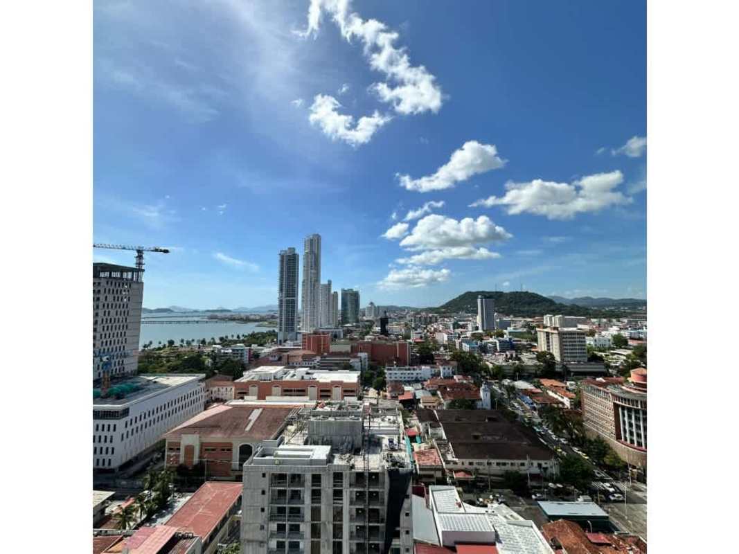 Bright modern living-dining room with balcony ocean views PH Balboa Bay Panama