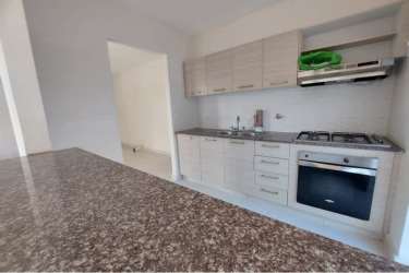 Unfurnished bright living room with tiled floors and windows in Islas de Montelimar La Chorrera Panama