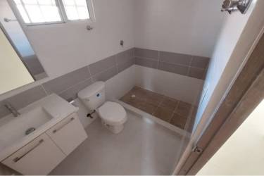 Modern kitchen with granite countertop and cabinetry in rental property La Chorrera Panama