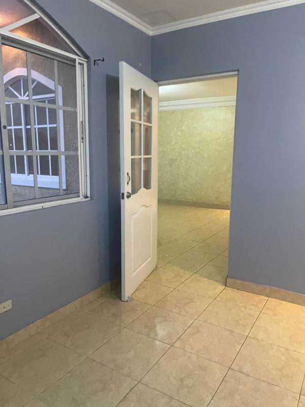 Small bathroom with green tiled shower area duplex house San Antonio Panama