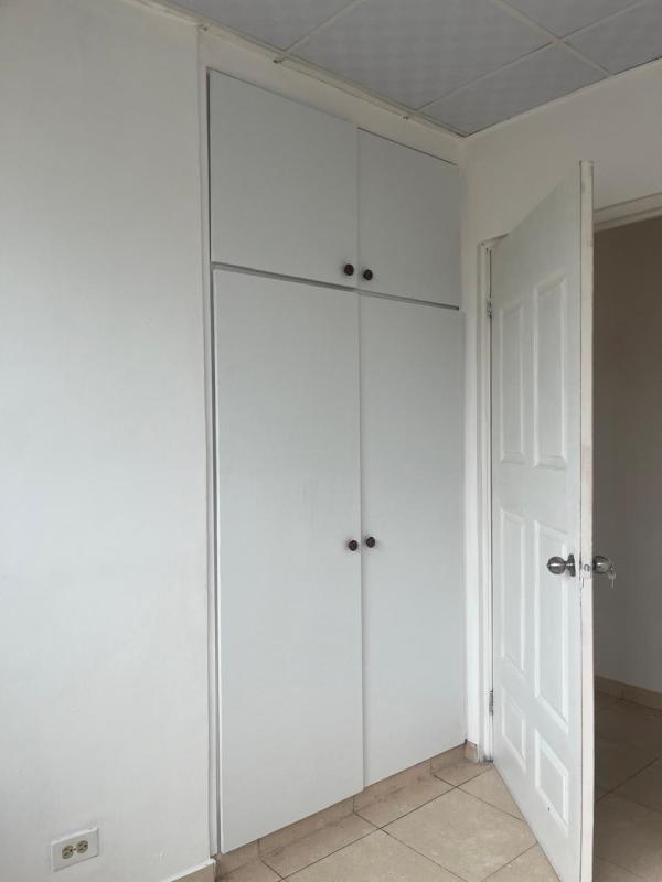 Functional white kitchen with granite counter and double sink house Cerro Viento