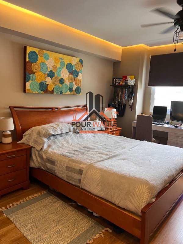 Facade and outdoor community of PH Altamira Gardens condominium complex in Ancón Panama