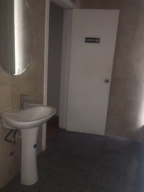 Wide office workspace with wooden flooring in Torre Banesco Panama