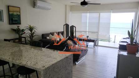 Bedroom with large window and ocean views Playa Caracol Tower Sanctuary Panama
