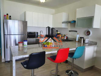 Contemporary bathroom with glass-enclosed shower and granite countertop Playa Caracol Nueva Gorgona Panama