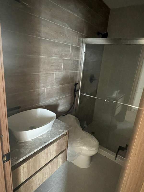 Open layout living room under renovation with herringbone tile floor in PH Brisa Marina Panama