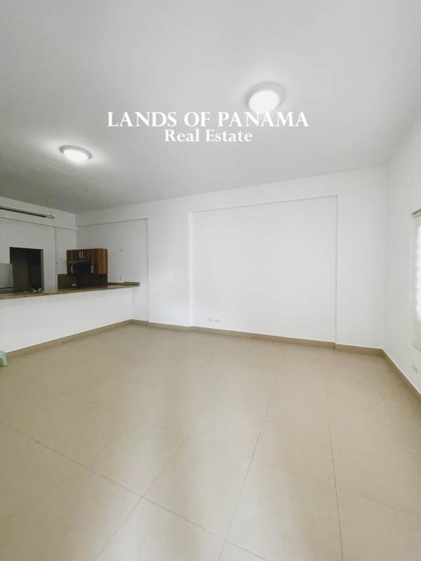 Swimming pool area with patio lounge and greenery in PH Embassy Village Albrook Panama City