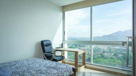 Minimal modern bedroom with window mountain view Royal Palm Nueva Gorgona Panama
