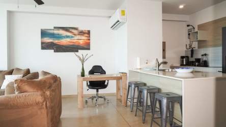 Modern apartment open layout kitchen and living room Royal Palm Nueva Gorgona Panama