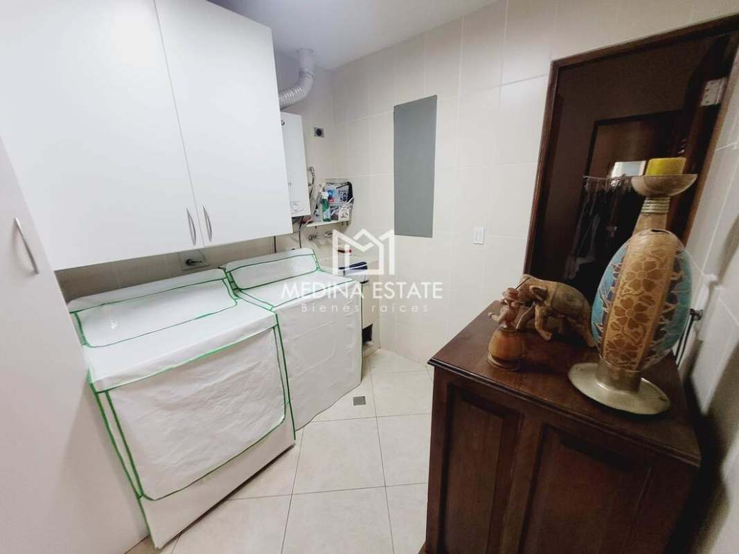 Private laundry room with gas appliances at Embassy Club Residence Clayton Panama