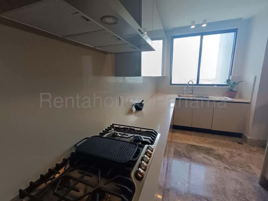 Contemporary kitchen with marble floors, double oven, stainless appliances in Santa Maria Golf Panama