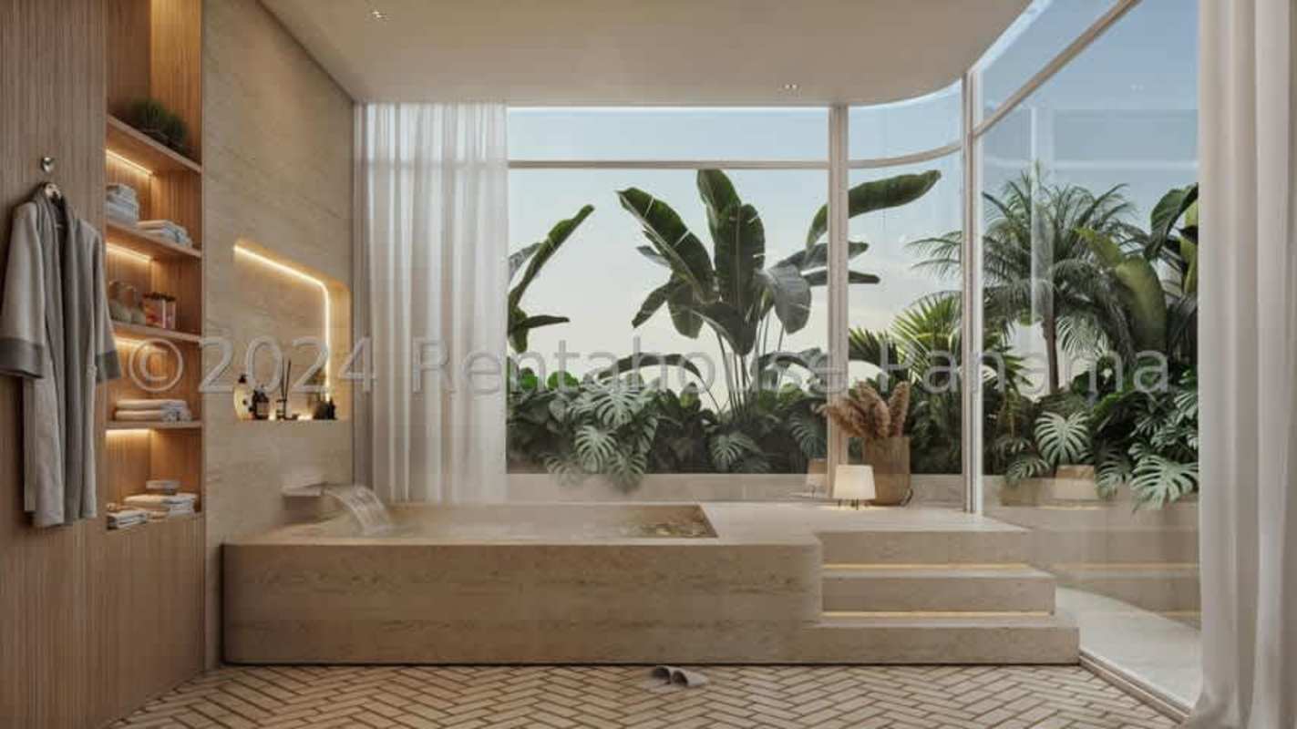 Spa-style bathroom with soaking tub and garden views at Ipanema Tower Costa del Este Panama